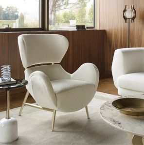 Julia poltrona, Avvolgente poltrona con base in metallo